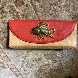 Mudpie coral and straw woven clutch hand bag